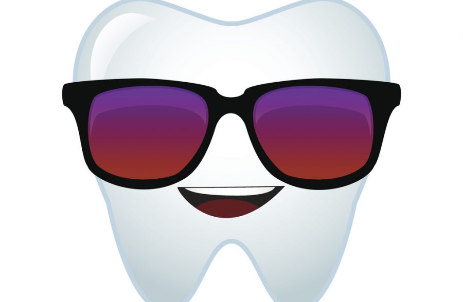Cool dentist tooth with sunglasses